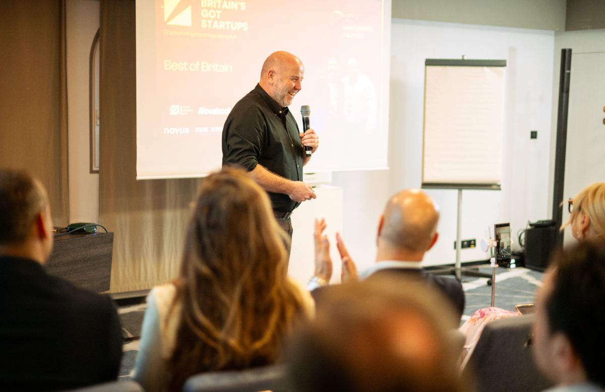 Founder on stage at the Lounge